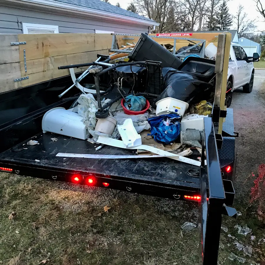 Roll-off dumpster delivered to a residential driveway in Owego